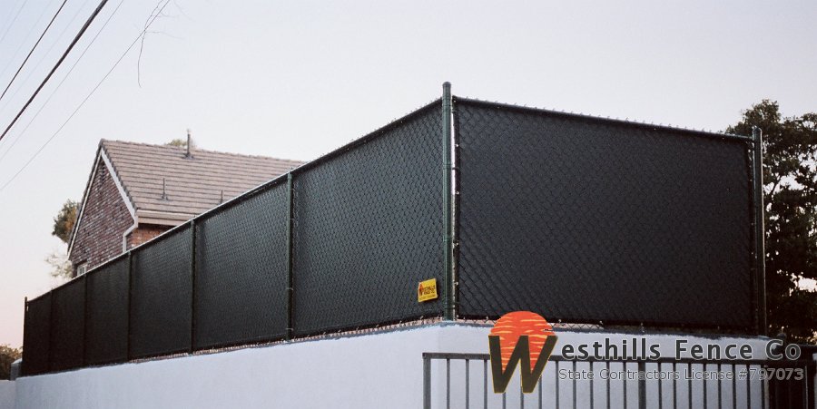 Black vinyl chain-link with solid mvinyl
