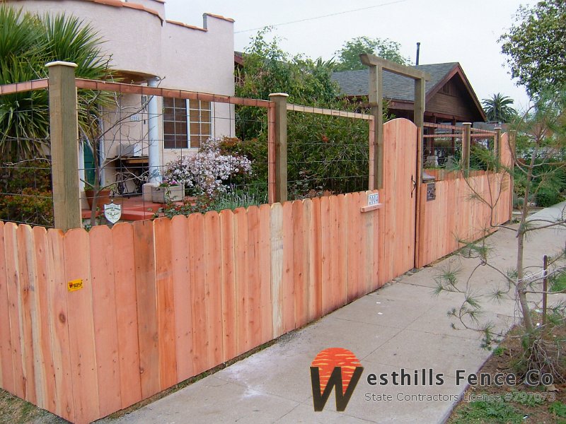 Dog-ear fence with welded wire on the top