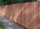 Dog-ear board on board redwood fence.JPG